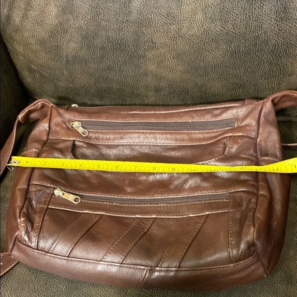 Brown Leather Messenger Bag with Adjustable Strap and Multiple Compartme…